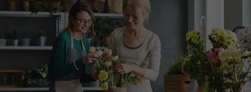 TeamFloral marketing site hero showing florists at work